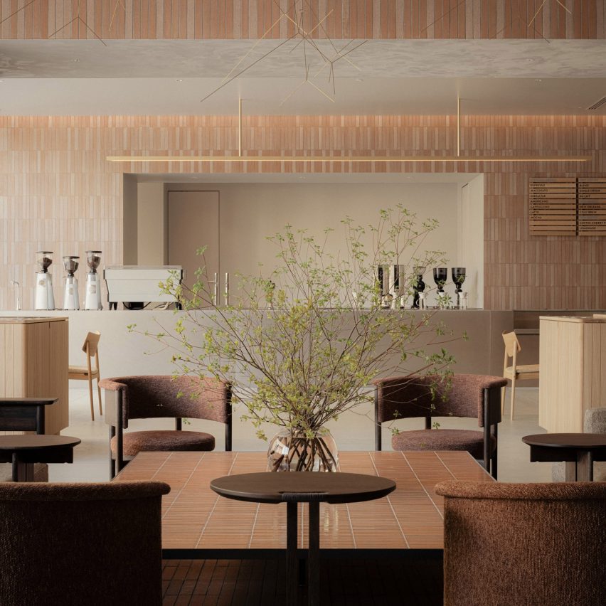 Locally produced tiles clad walls and table in Blue Bottle Coffee shop in Nagoya