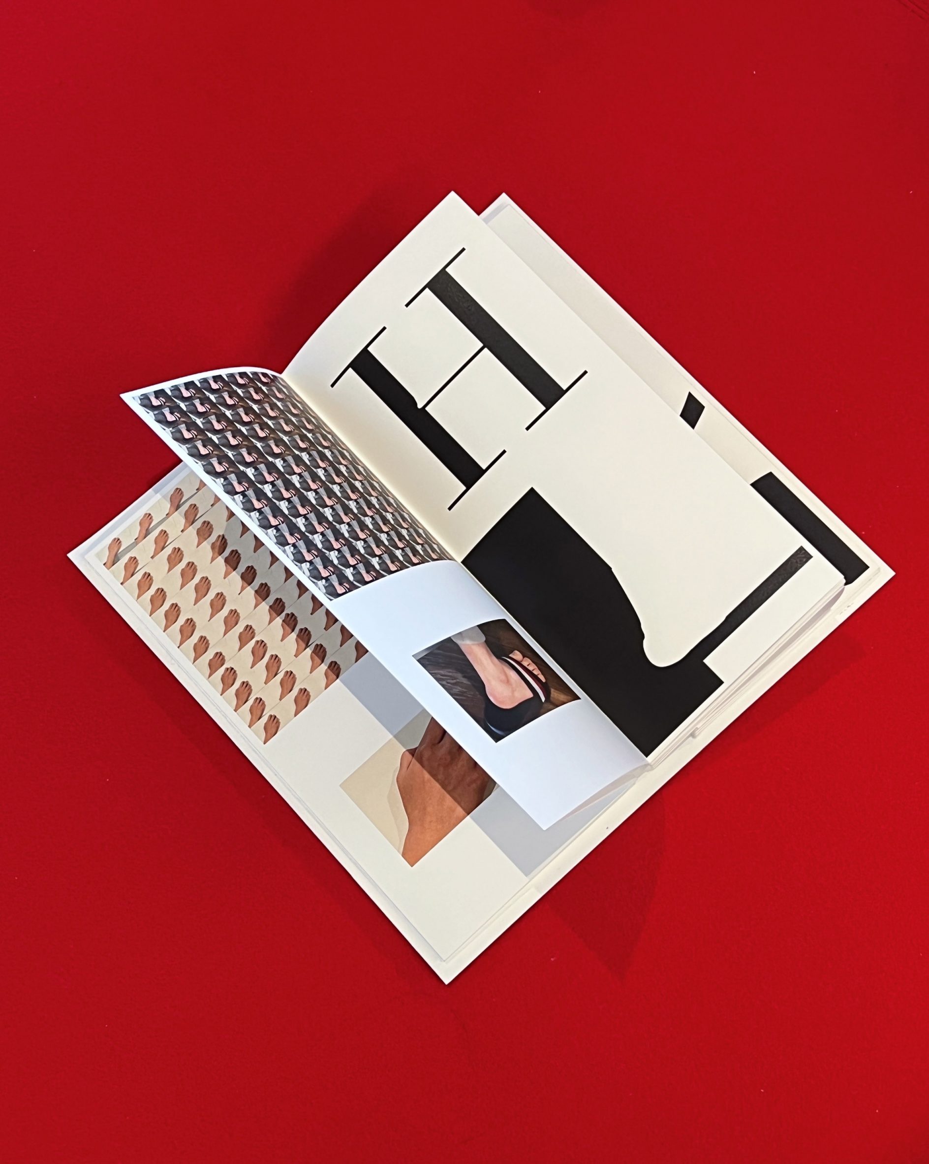 Open magazine on red background