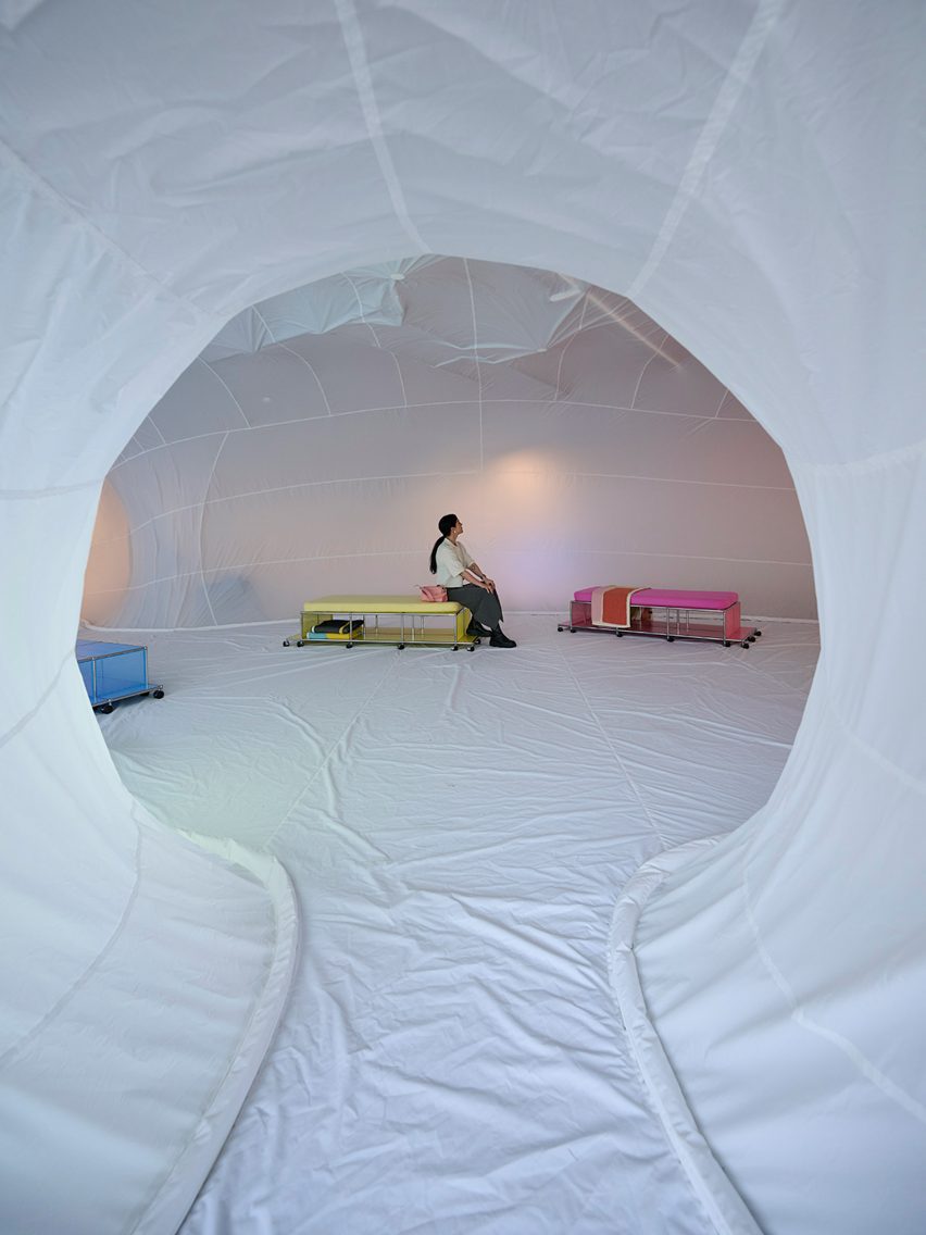 White inflatable with blankets and pillow