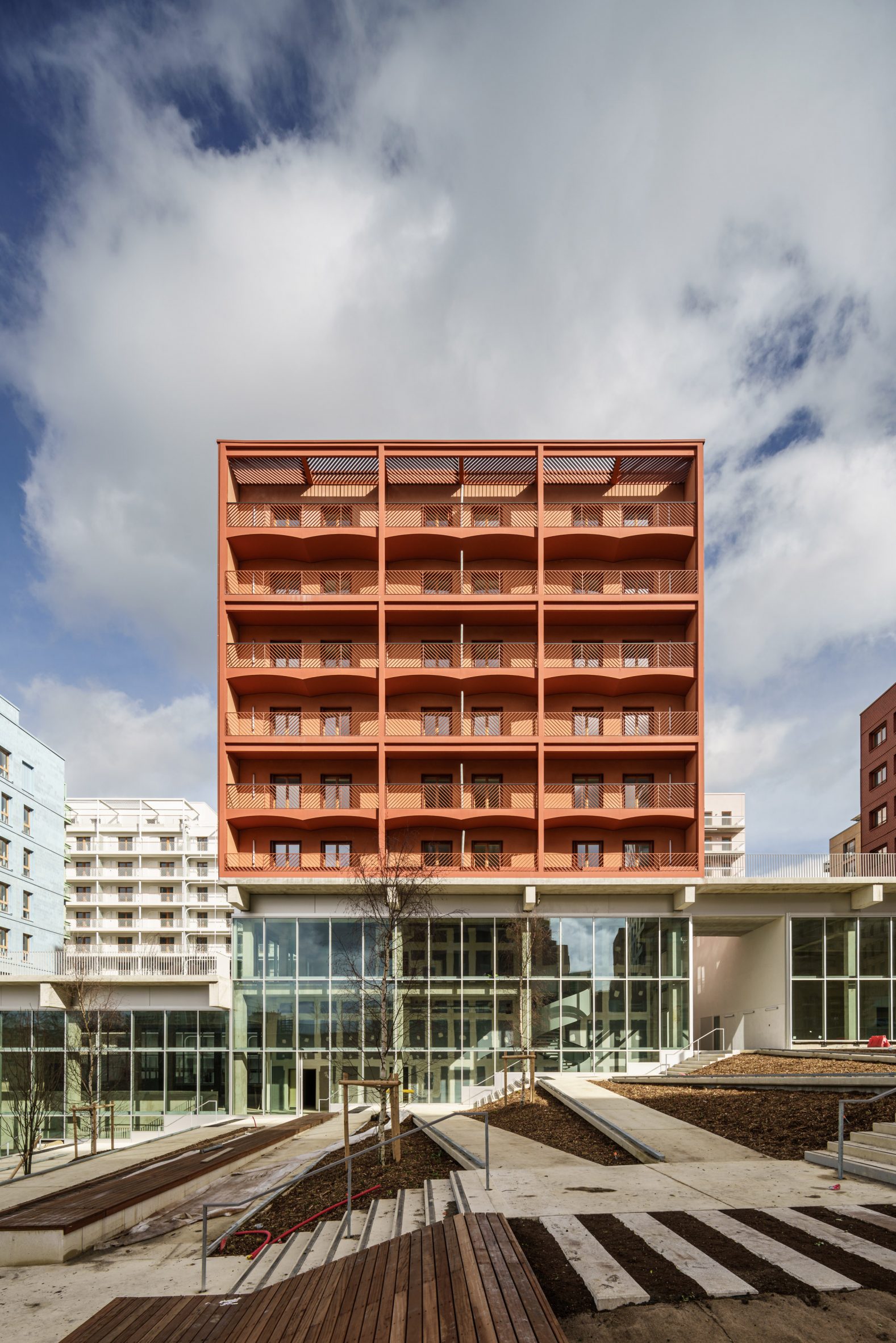 Orange-coloured apartment block by Brenac & Gonzalez & Associés