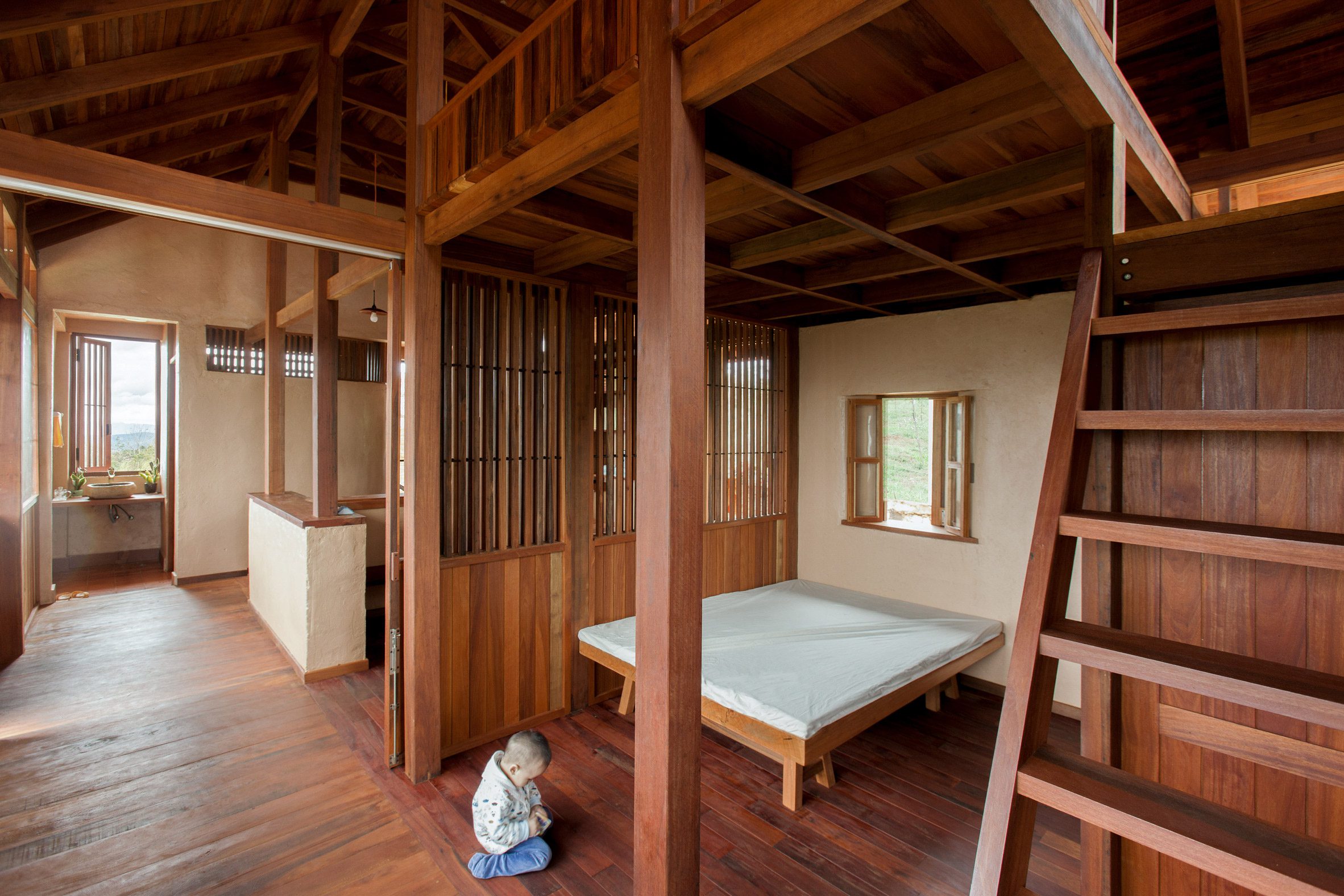Bedroom interior at Di Linh House in Vietnam