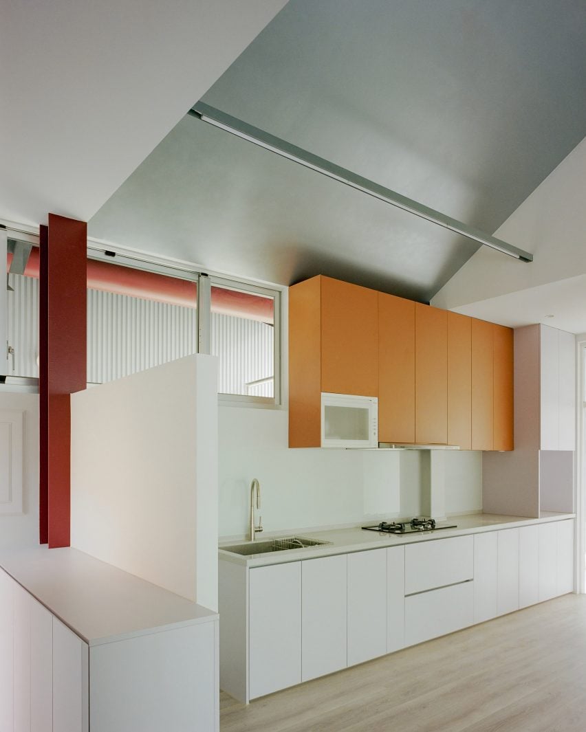 Kitchen interior within home by Studio Tngtetshiu