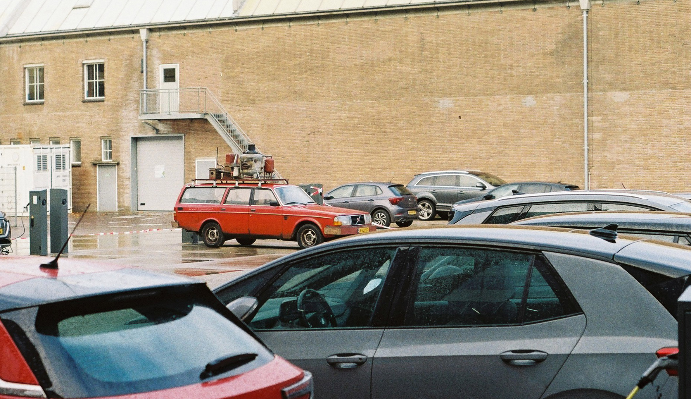 Photo of the Plastic Car taken from a distance across a car park