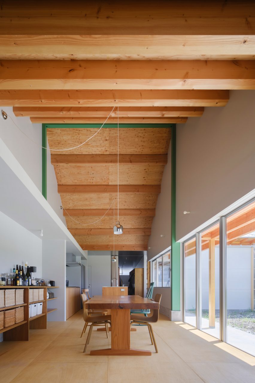 Dining room with sloped wooden ceiling