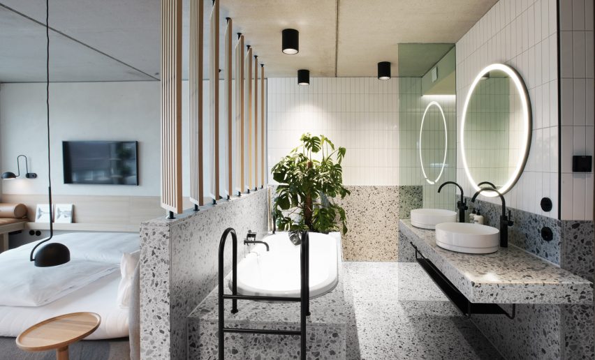 Bathroom interior at boutique hotel by Studio Aisslinger