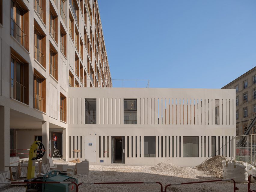 View of Ilot Saint-Germain social housing by Francois Brugel Architectes Associes, h2o Architectes, and Antoine Regnault Architecture