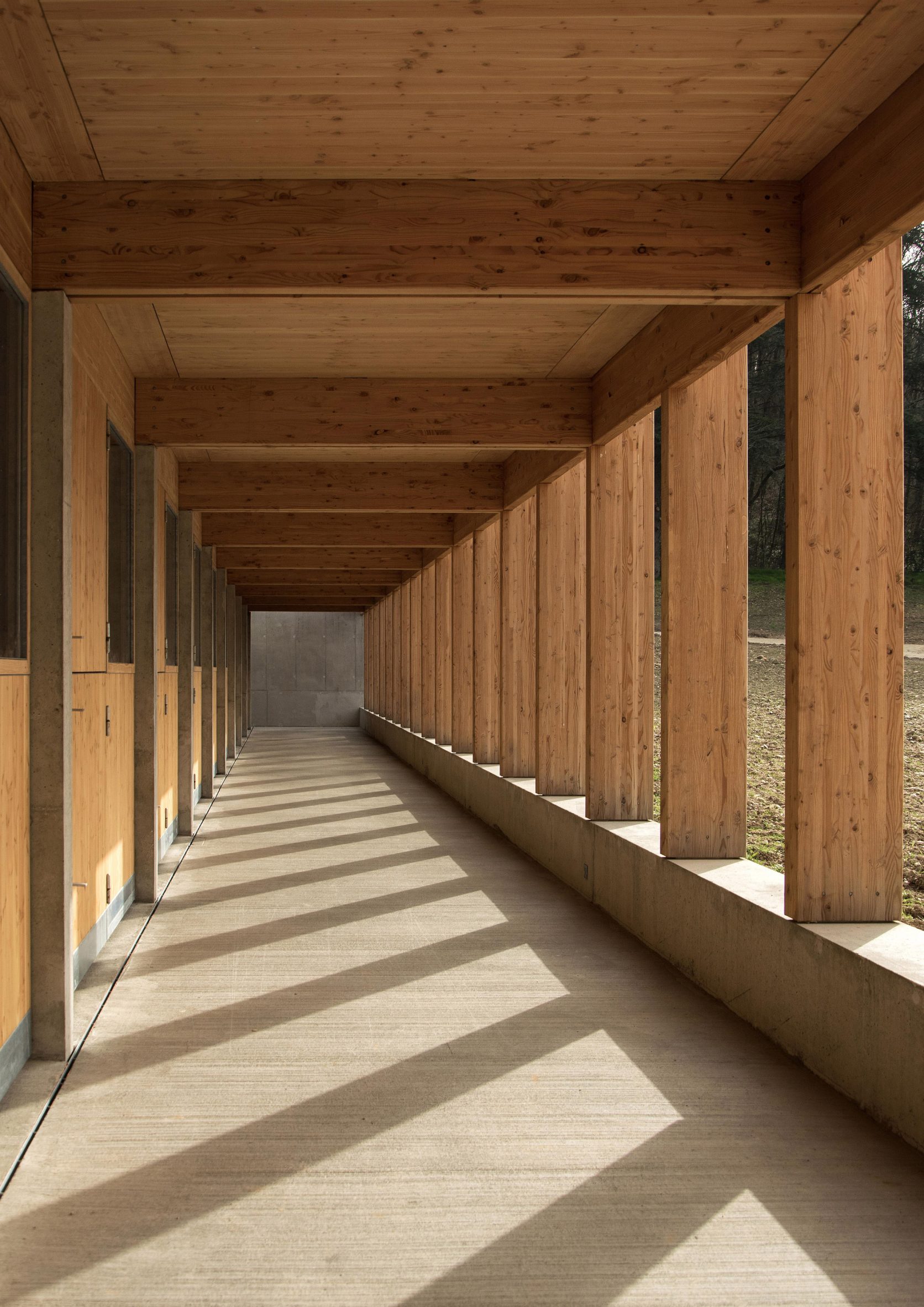 Porticoes at Les Écuries de la Roche stables by F+G Architectes