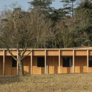 F+G Architectes creates "deliberately restrained" timber stable near Lyon
