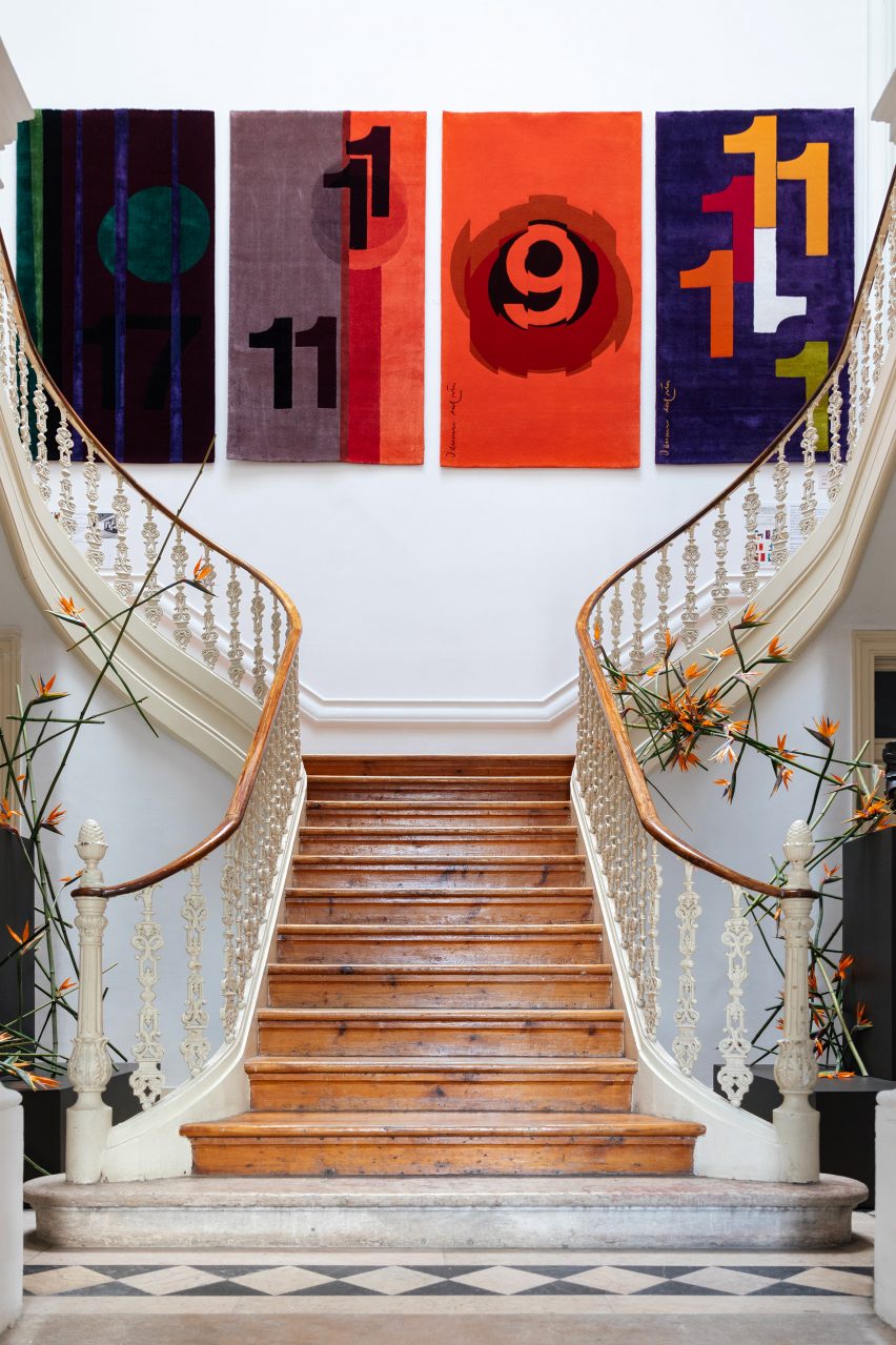 Wall tapestries up a staircase