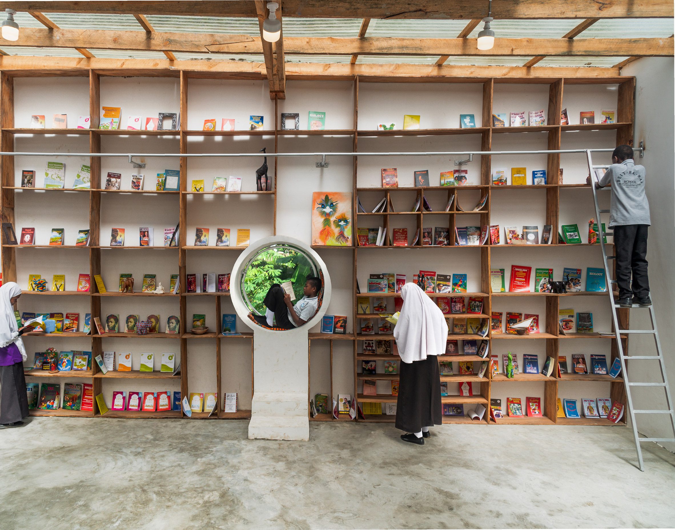 Wooden bookshelves inside Zanzibar children's library