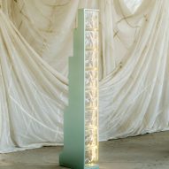 Glass column with integrated lighting