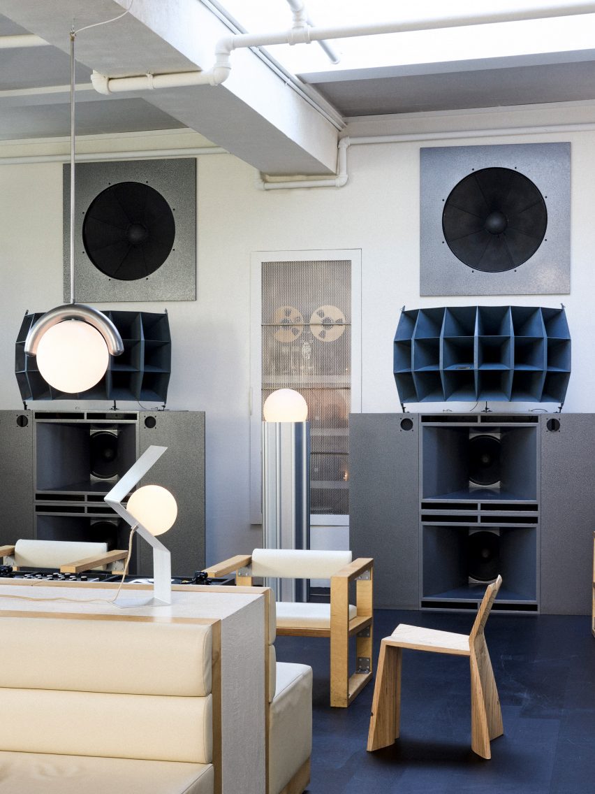 Metal design pieces with large stereos