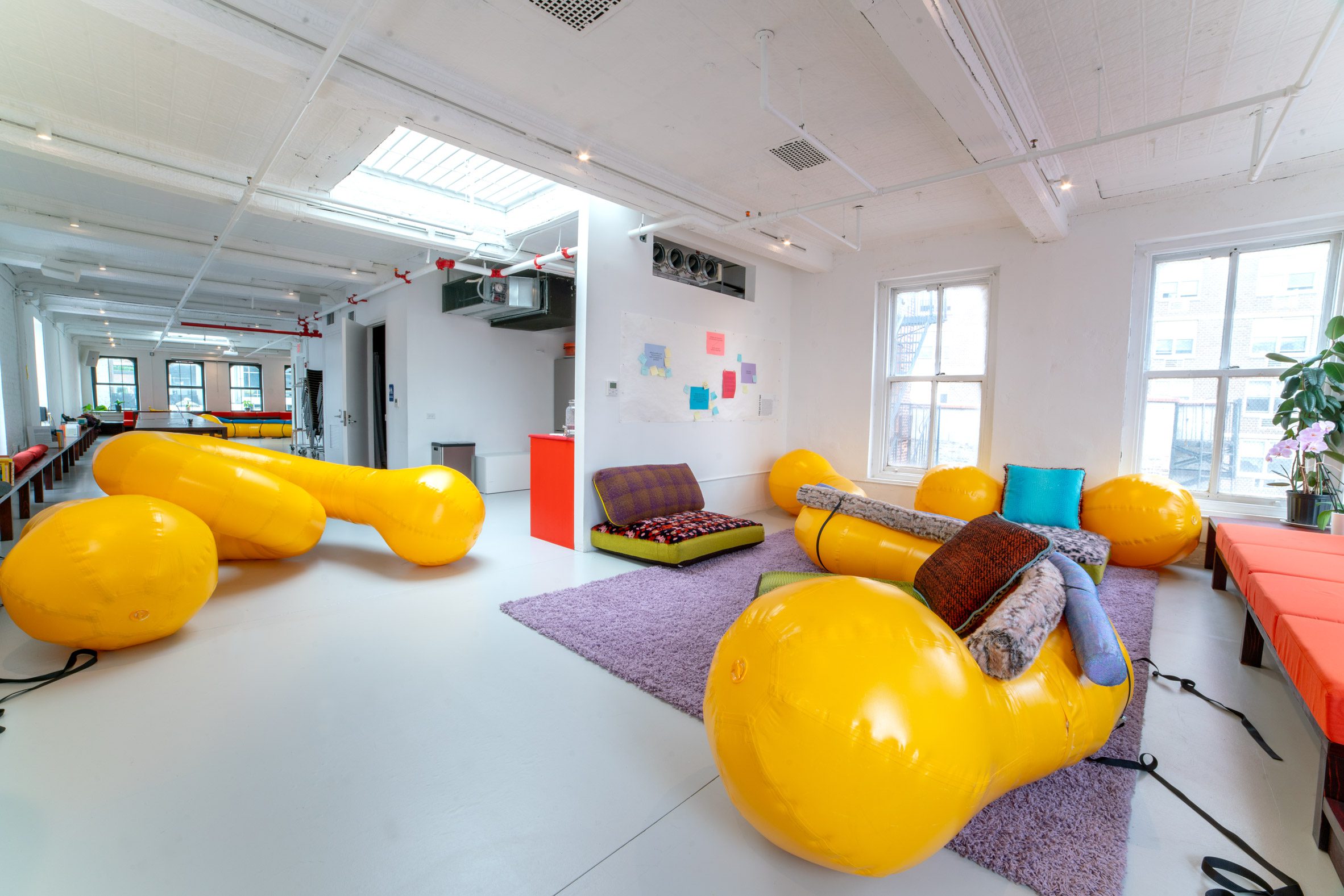 Yellow inflatable seating in room