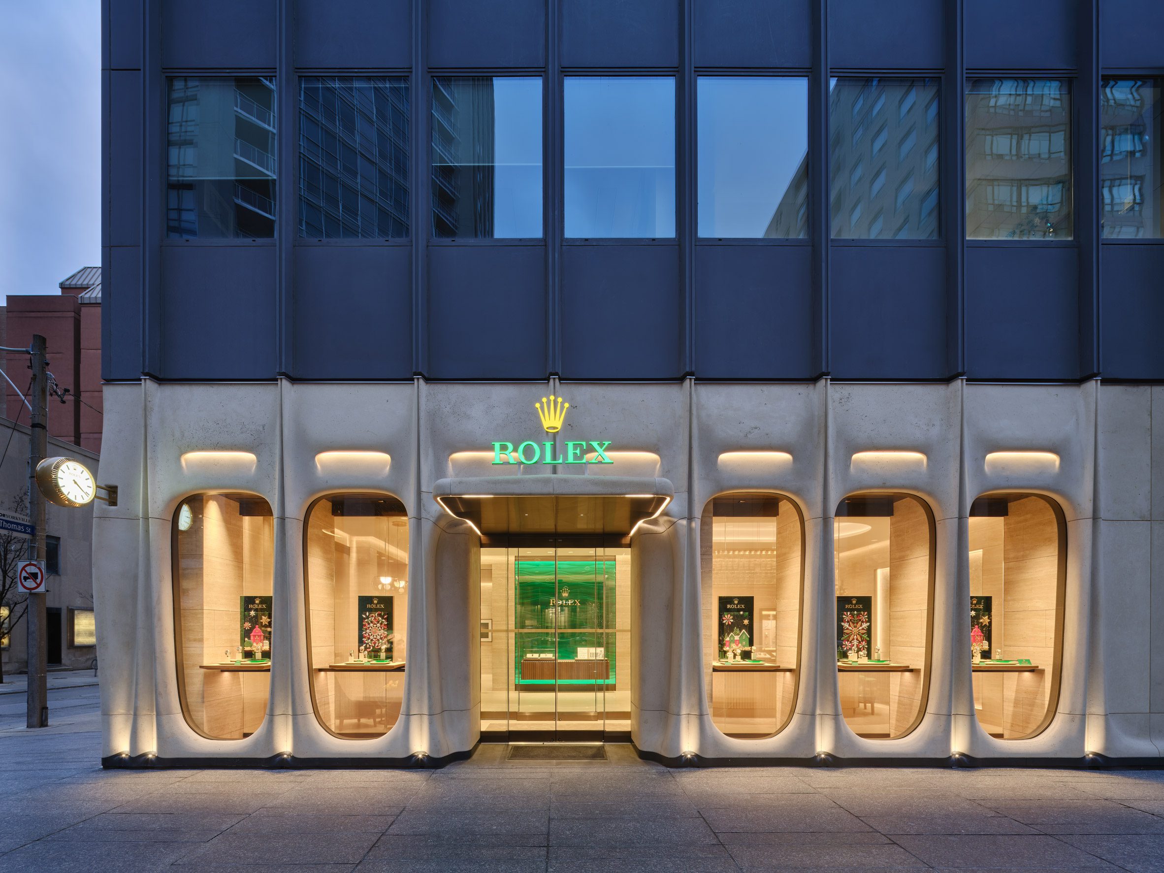 Front facade of the Rolex Toronto store at night