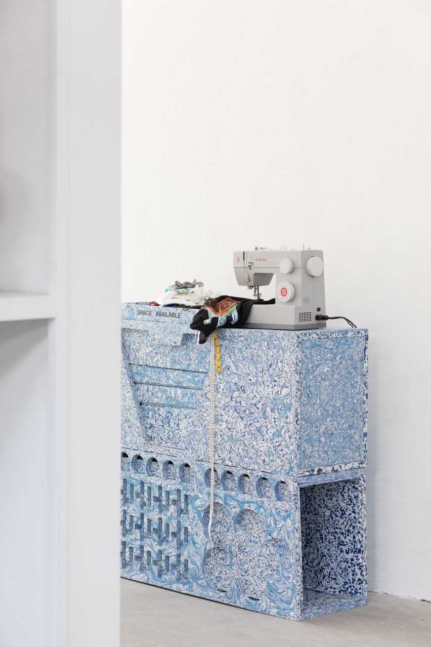 Sewing machine on recycled plastic stand