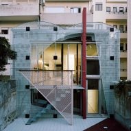 Fala Atelier adds geometric "metal masks" to exterior of Porto apartment