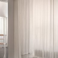 White curtains and ballet barre