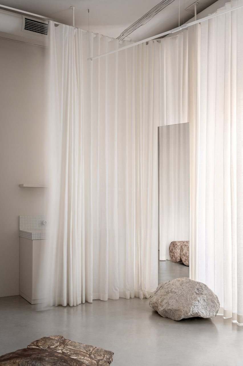 White curtain with boulders
