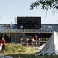 Invisible Studio and Mole Architects create "big shed" as Forest School Camps base