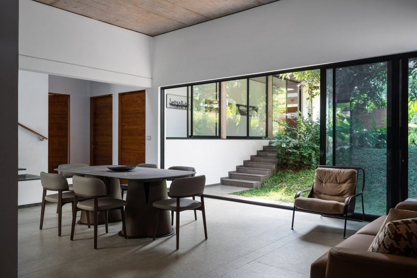 Dining area within The Stoic Wall Residence in Kerala