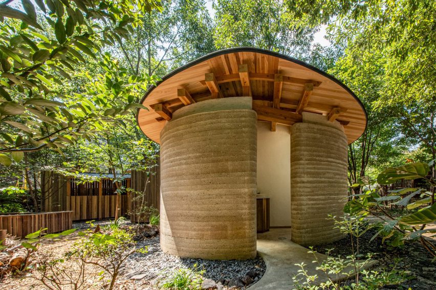 Toilet in Japan with walls coating in rammed earth