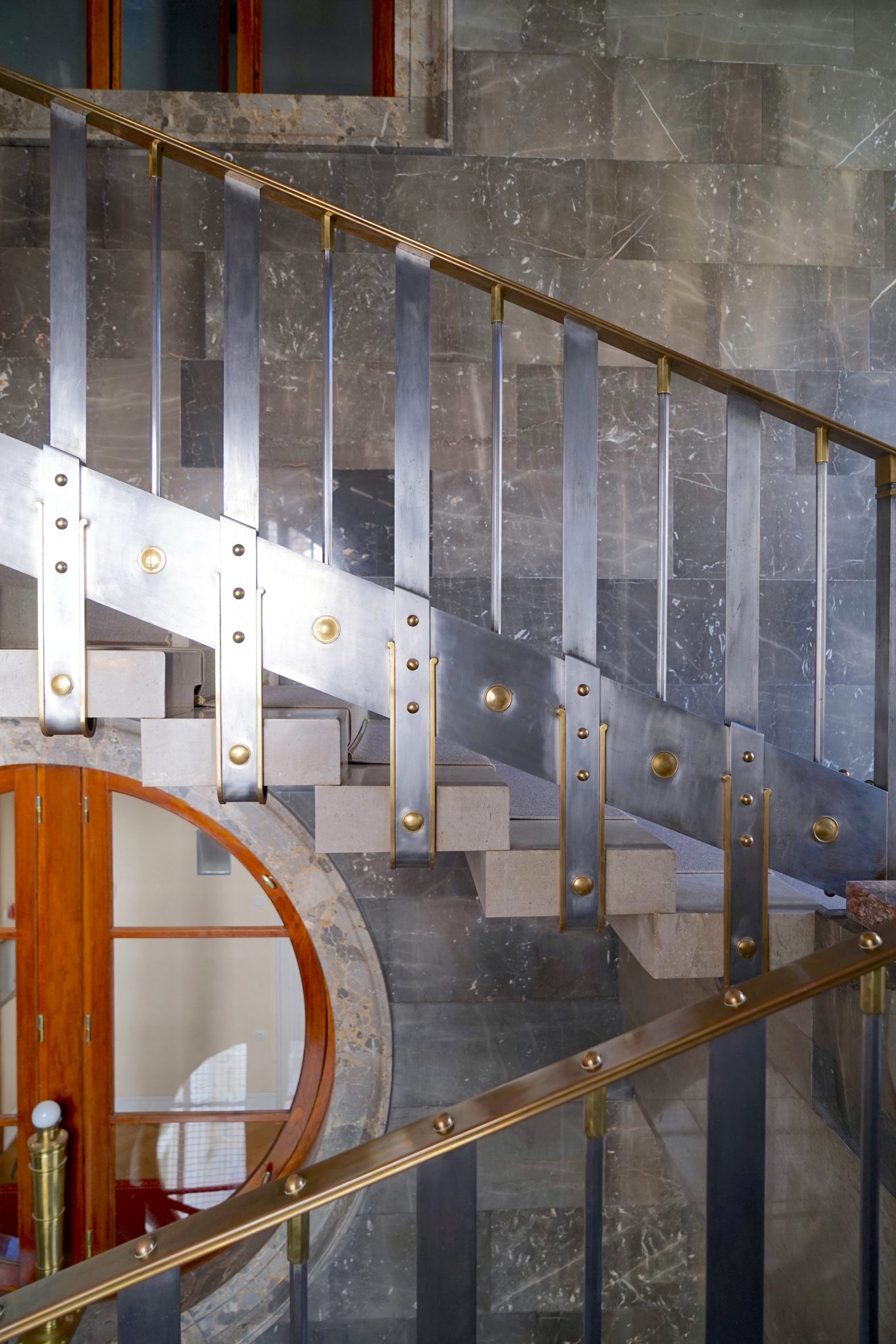 Metal staircase with metal handrail