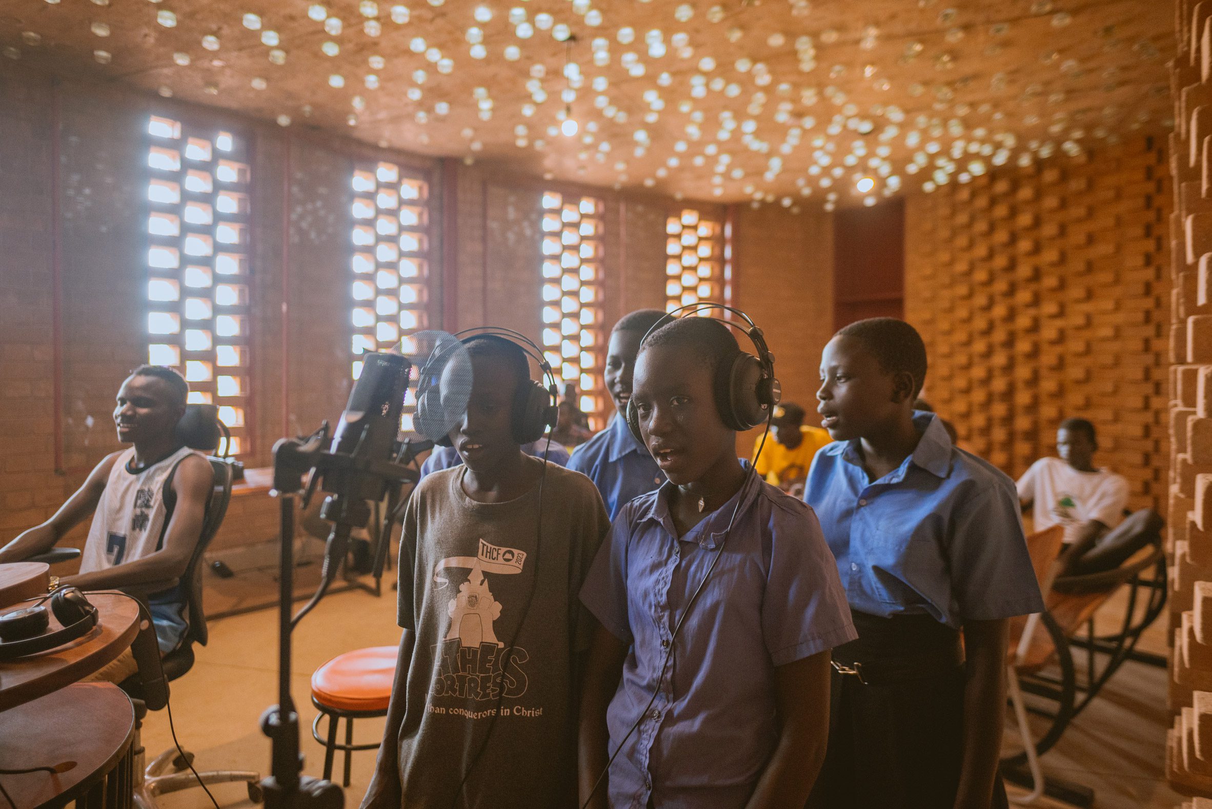 Children recording at Bidi Bidi Performing Arts Centre by Hassell and LocalWorks