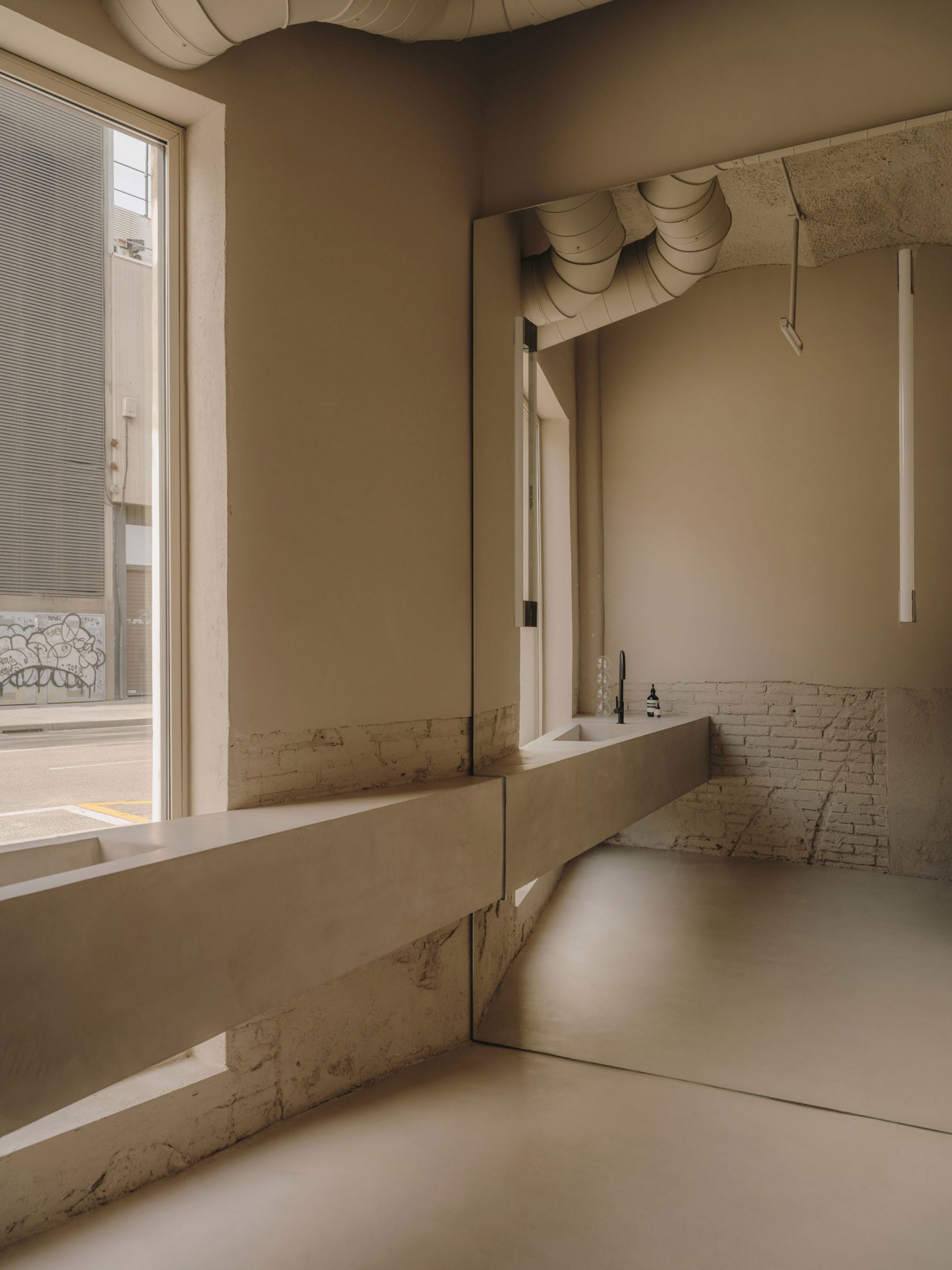 Bathroom interior of Blow Models office in Barcelona, designed by Isern Serra