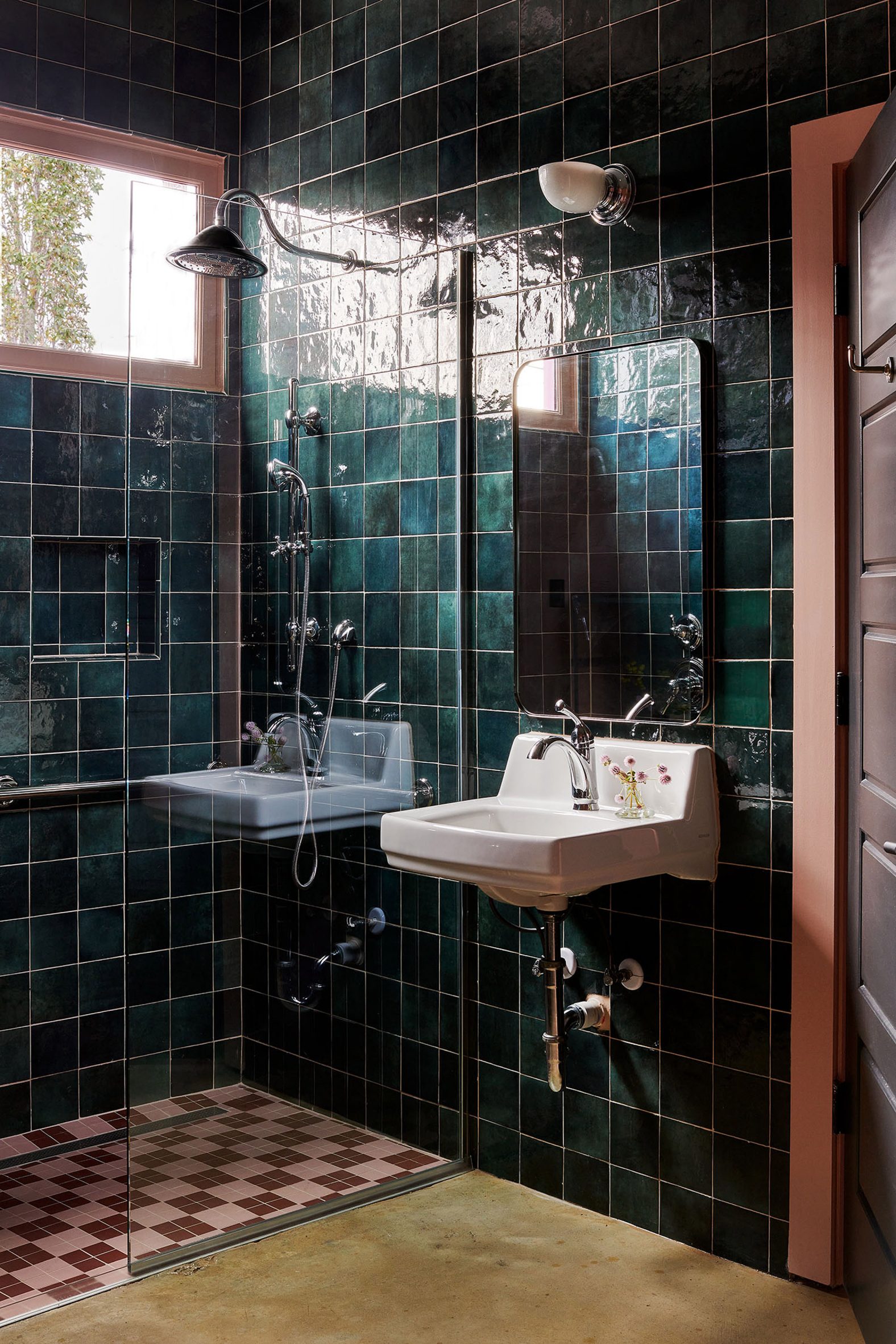 Bathroom with green, red and pink tiles