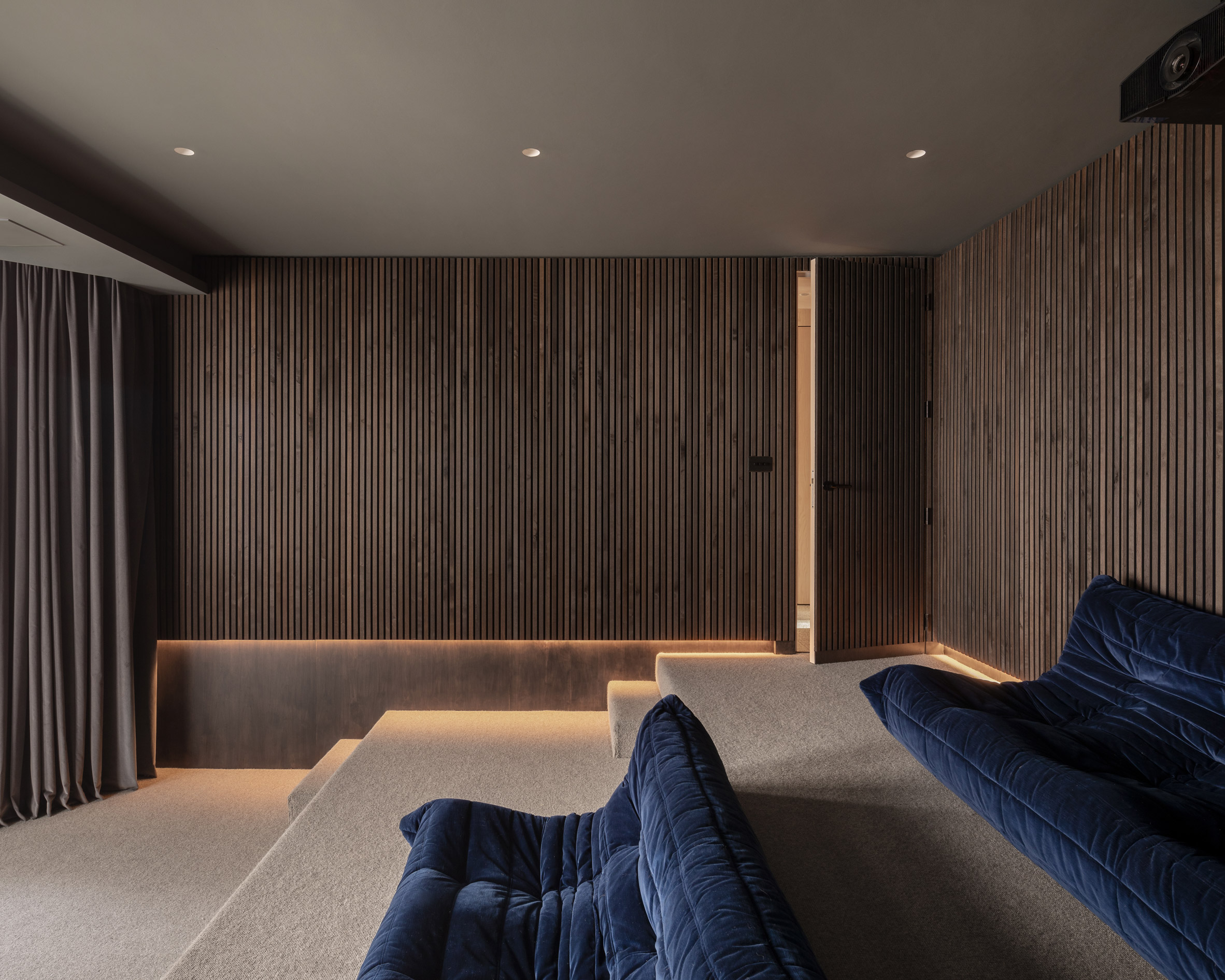 Cinema room within London house extension by Proctor and Shaw