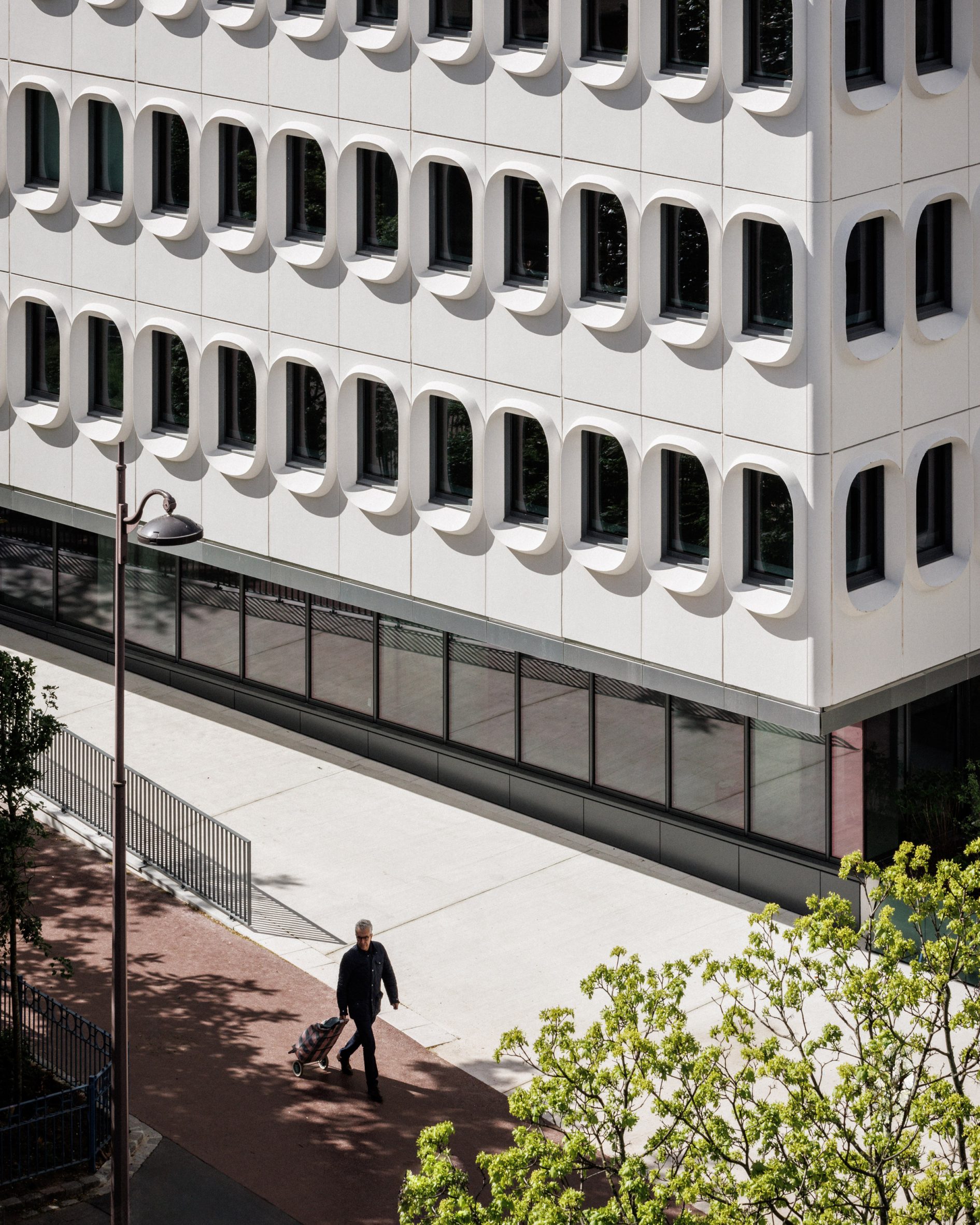 Facade exterior of mixed-use building by Calq and Bond Society
