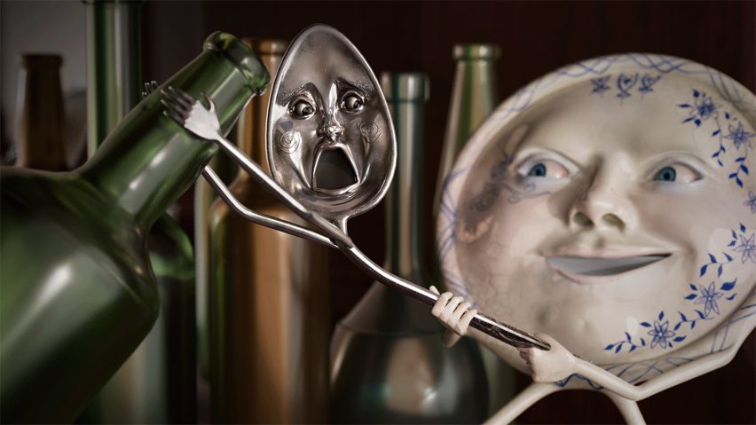 A still from a stop motion animation of a circular white and blue plate and a silver spoon, both with faces and arms. The plate is holding onto the soon, which is holding onto a green glass bottle.