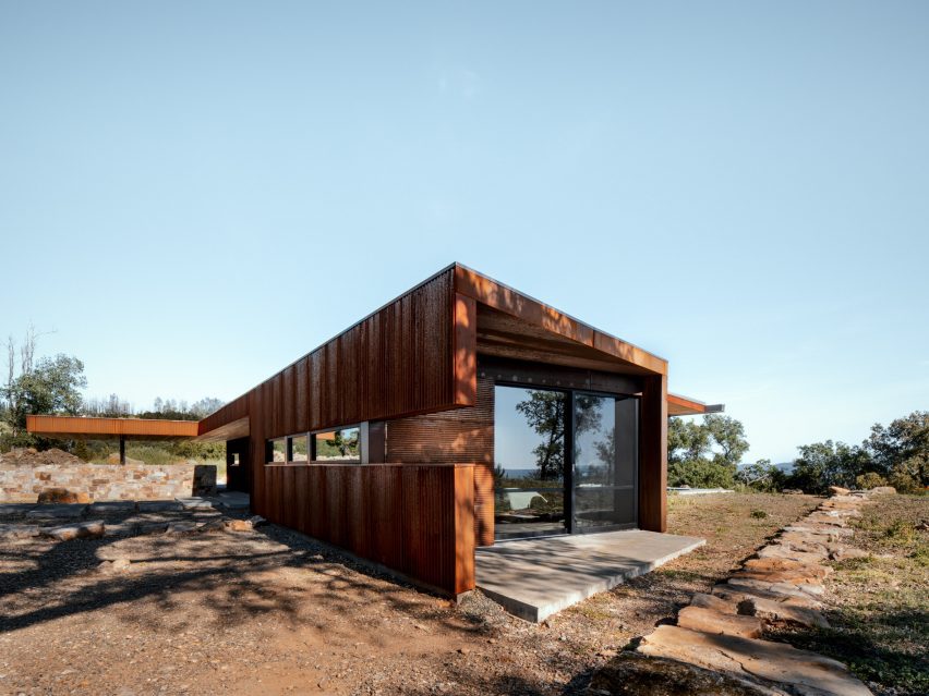 Geometric weathering steel-clad house
