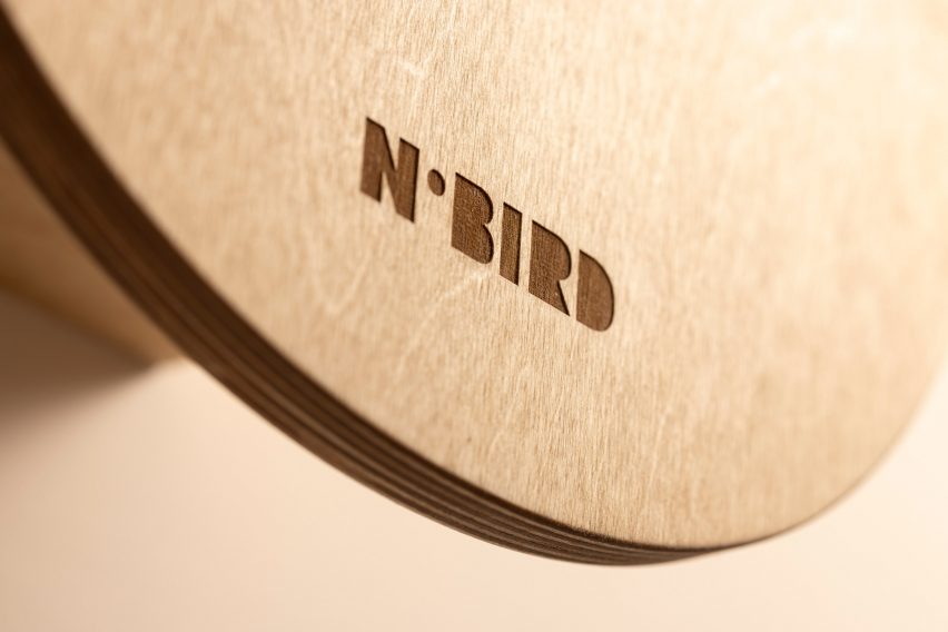 A close up photograph of wood with the word 'nobird' etched out in a darker colour.