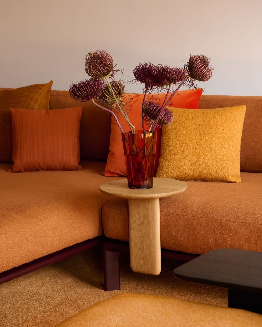 Photo of the Vitra Anagram sofa in a burnt orange fabric and corner configuration