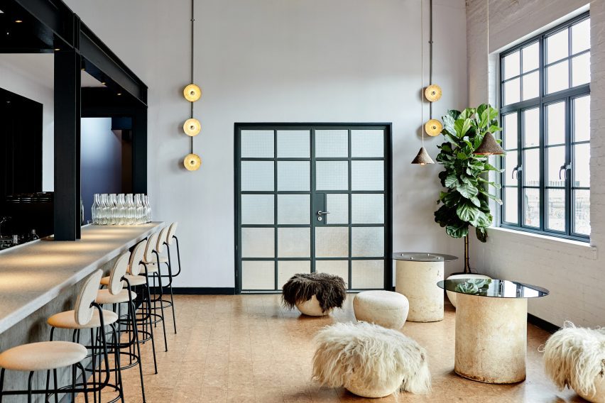 Bar and lounge area in the corner of a restaurant interior