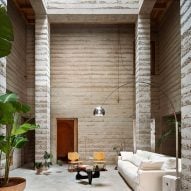 Textured layers of poured concrete enclose Barcelona home by H Arquitectes