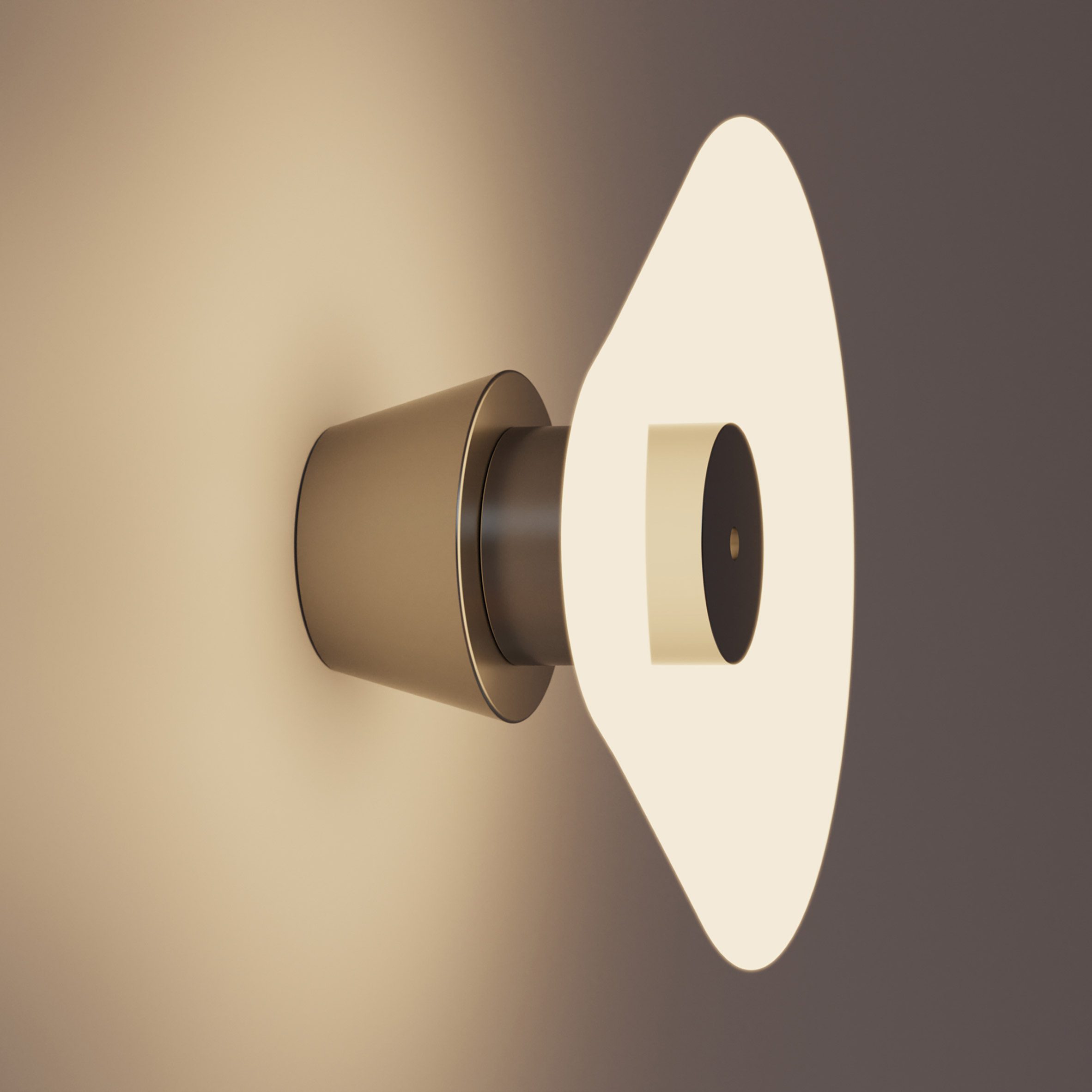 A photograph of a rounded illuminated light attached to a wall, in warm tones of beige and brown.