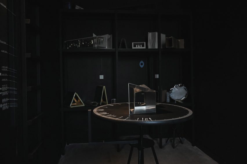 Photograph of a dark space with objects inside