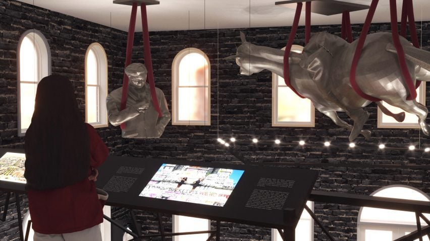 A visualisation of a museum space with black bricks on its walls. There are silver statues hanging from the ceiling in red rope, and a person viewing them.