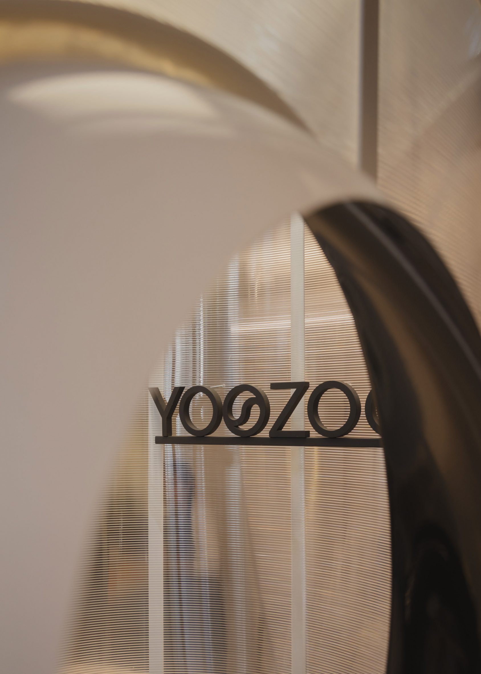 Yoozoo logo affixed to a polycarbonate shell