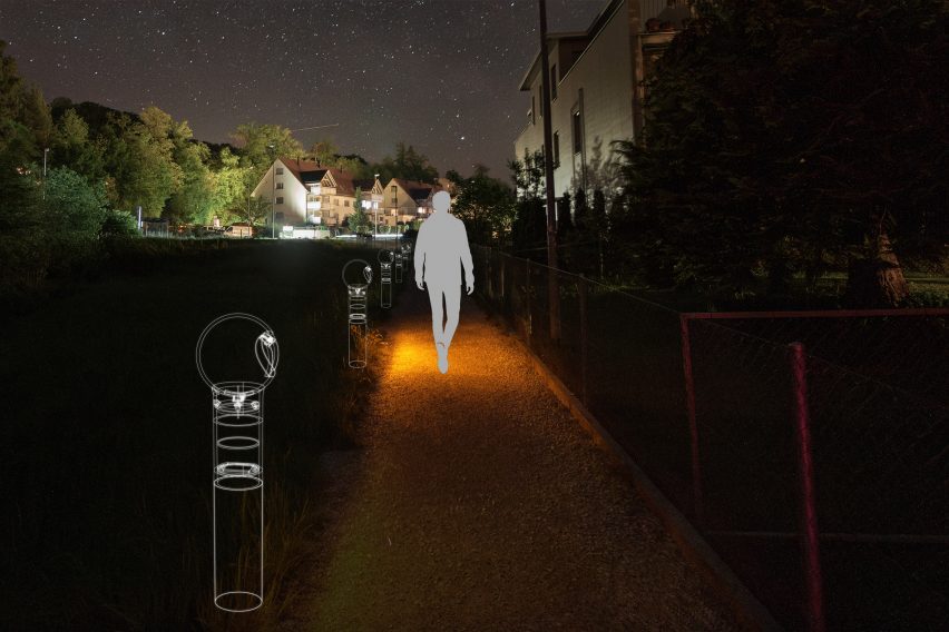 A visualisation of a figure walking down a path at night which is illuminated by orange light.
