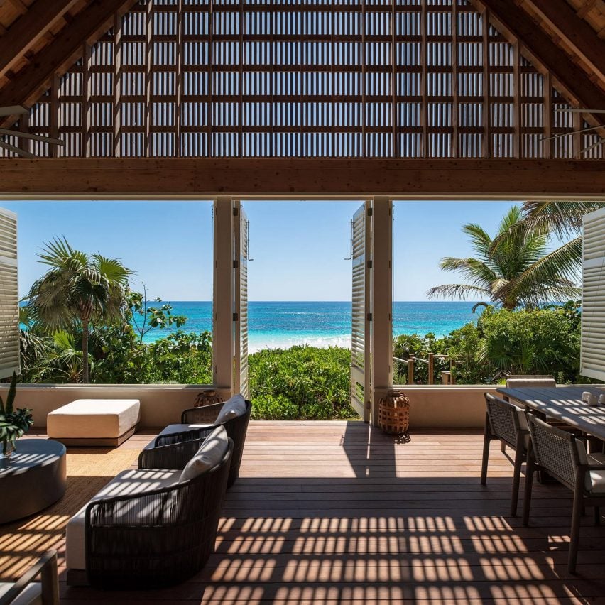 Photo of Pink Sands Beach house in the Bahamas by Brillhart Architecture and Darren Sawyer