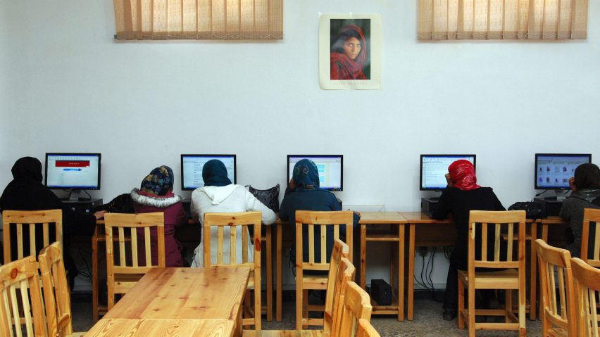 Afghan women working at computers