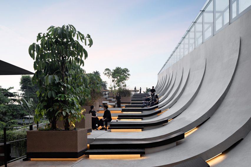 Seating space on rooftop of Jakarta restaurant by RAD+ar