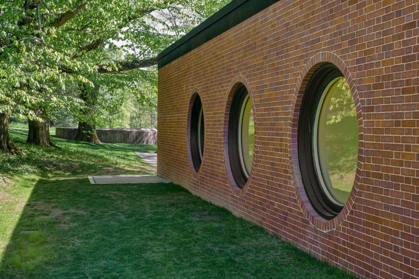 Port Hole windows along the Brick House