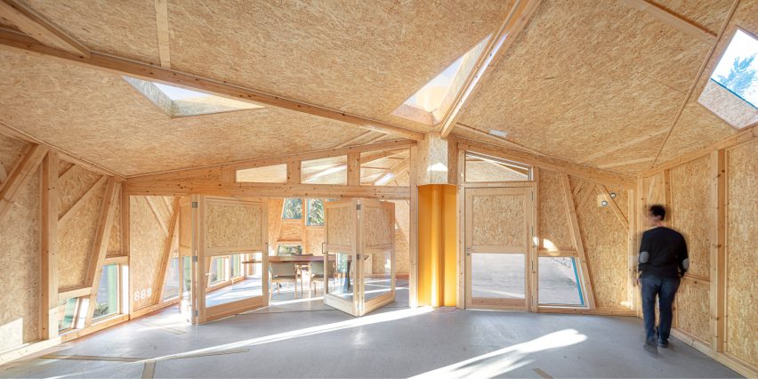 Wooden interior of Can Zariquiey Health Centre Foyer in Spain