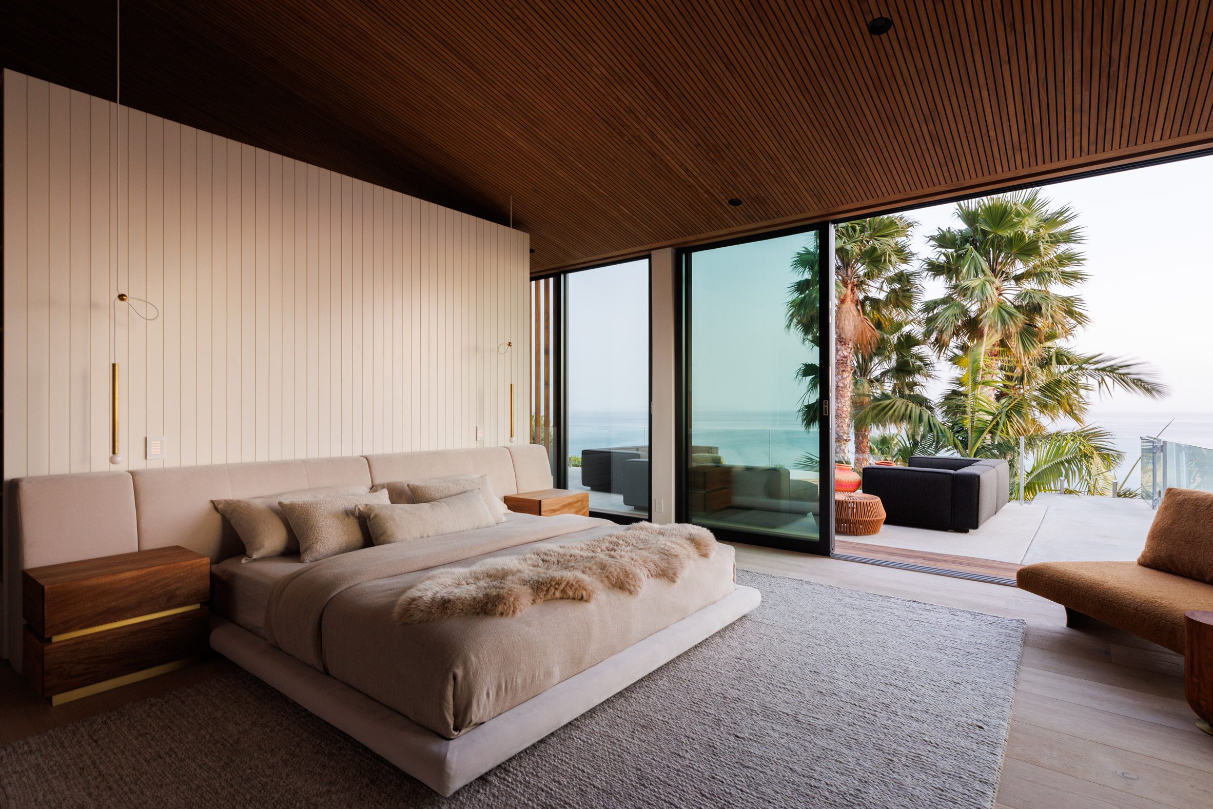 Bedroom with sliding doors that open onto a terrace