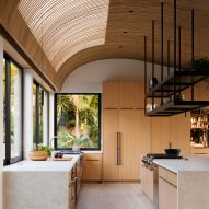 Sophie Goineau adds "wave-like" timber ceiling to Malibu beach house