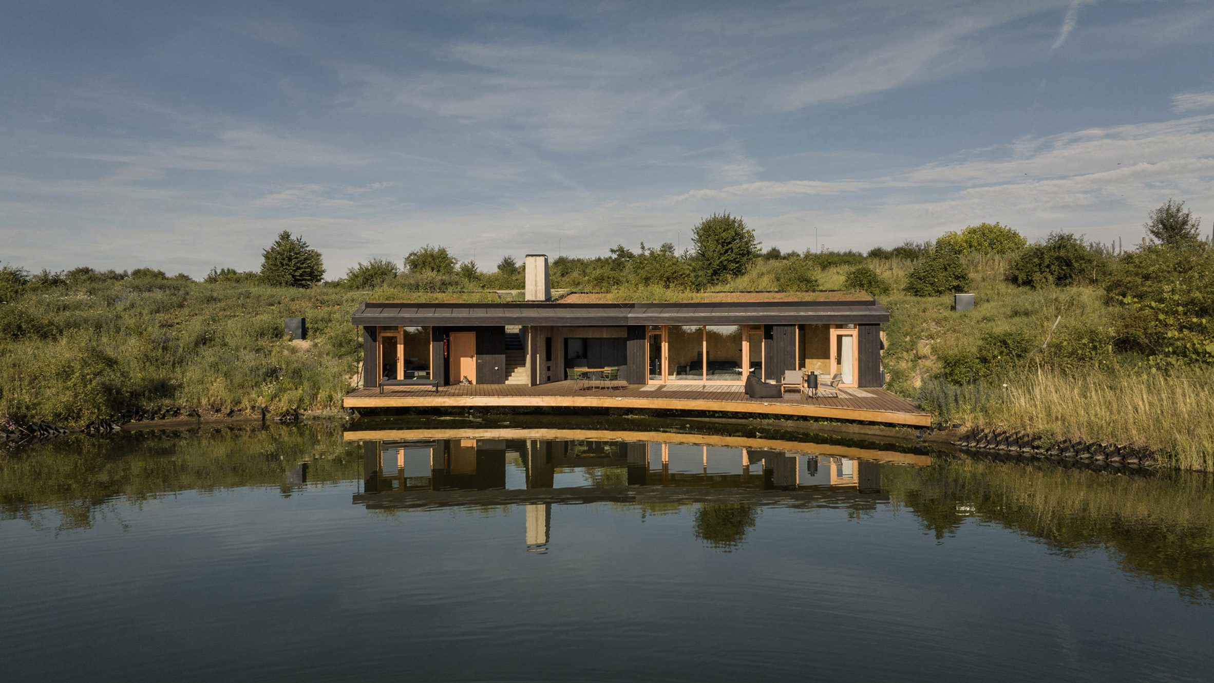 Hello Wood designs grass-topped CLT House as 